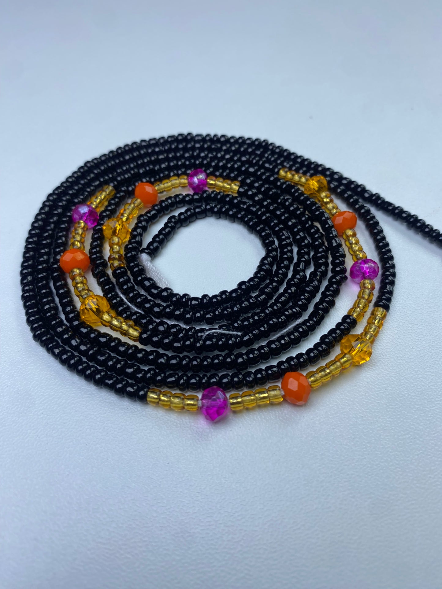 Black waist bead.