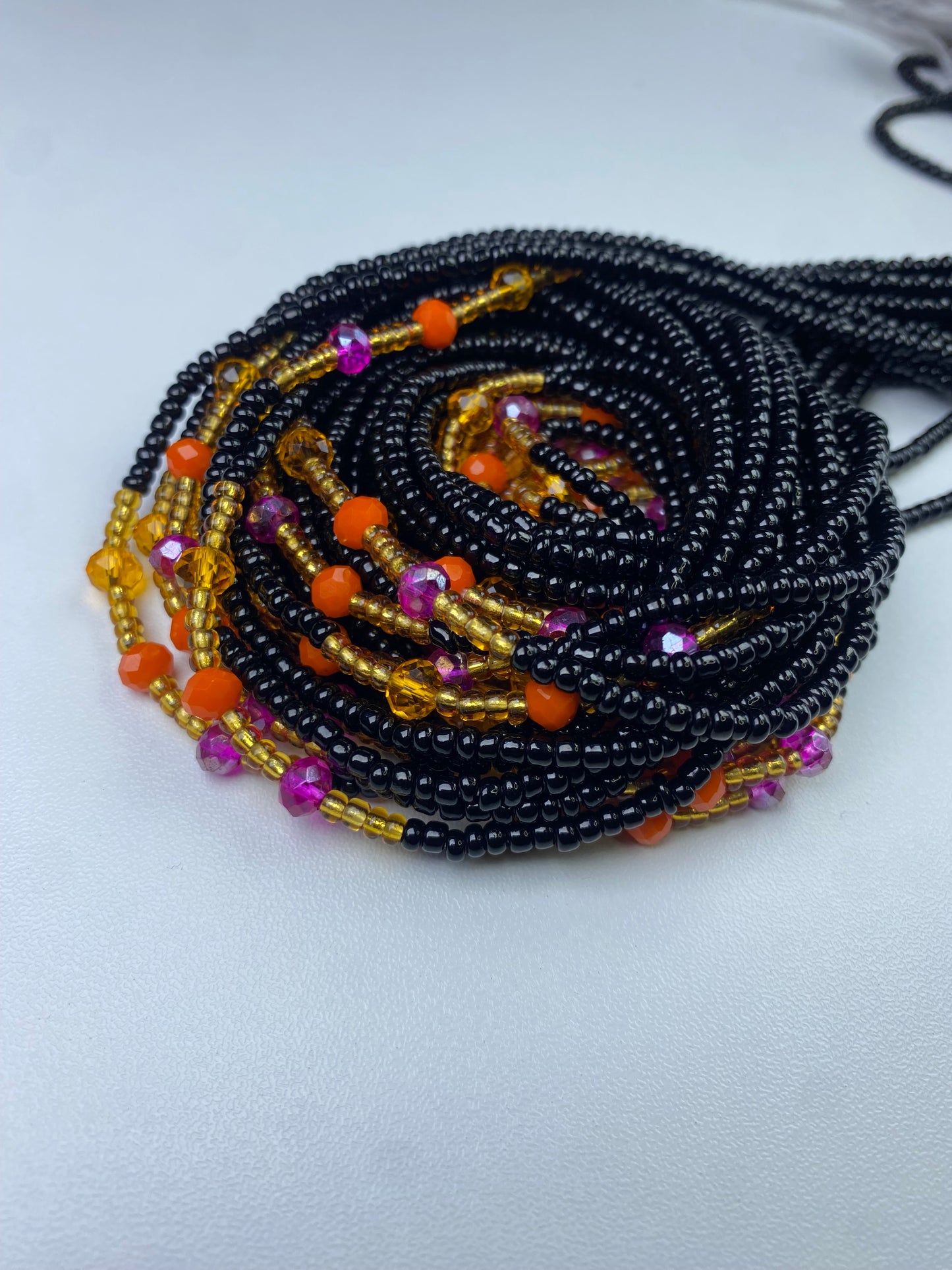 Black waist bead.