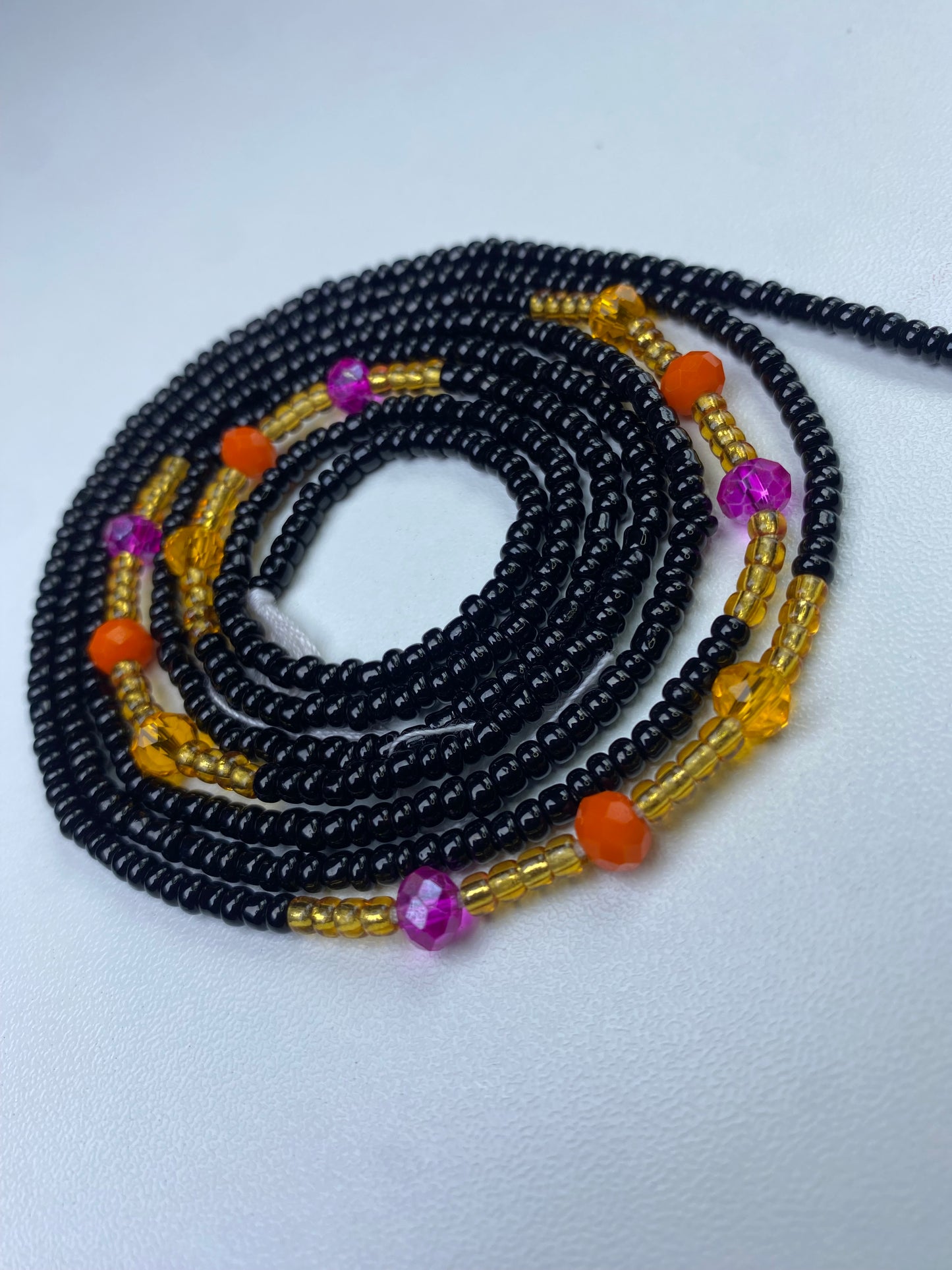 Black waist bead.