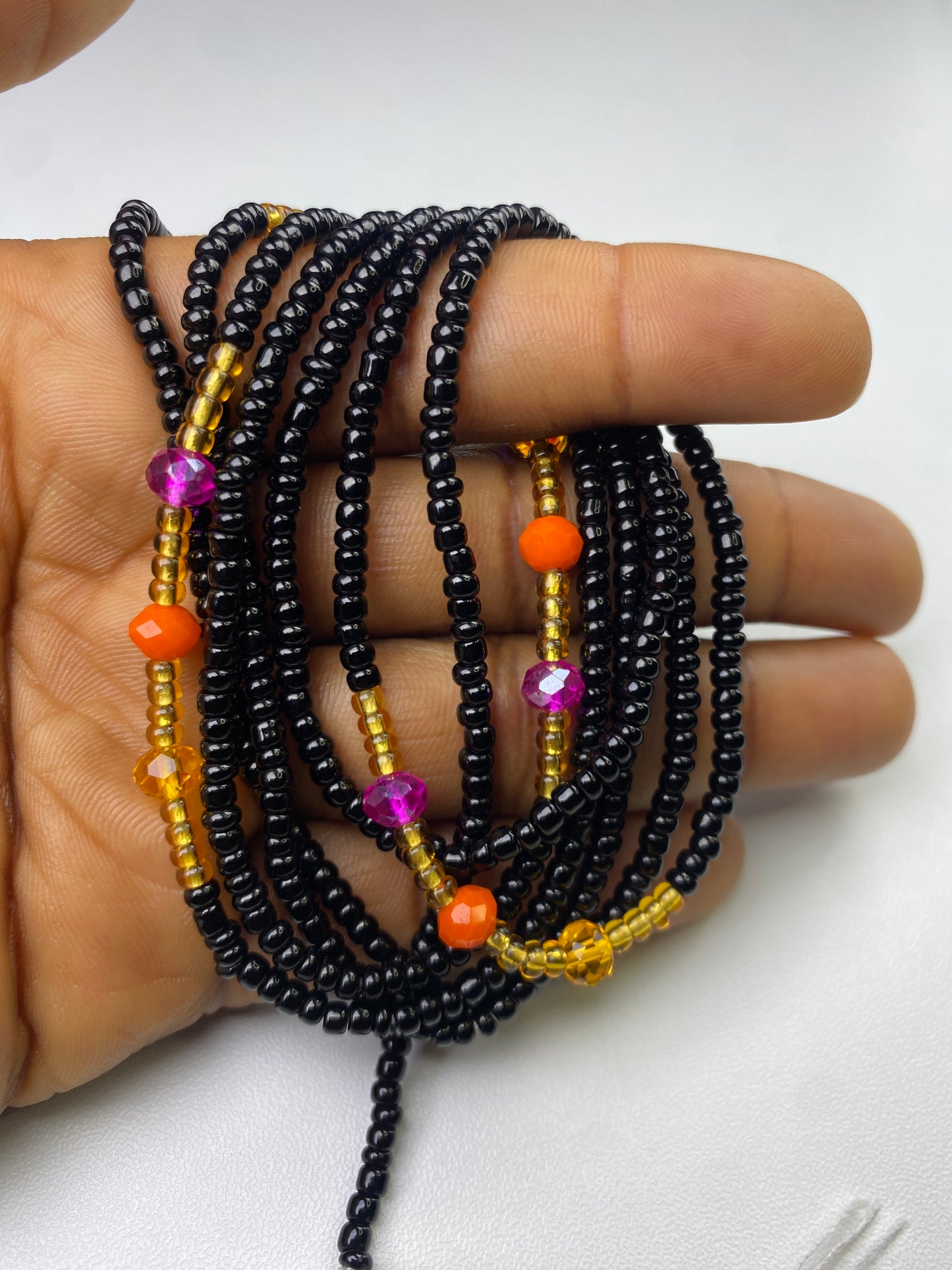 Black waist bead.